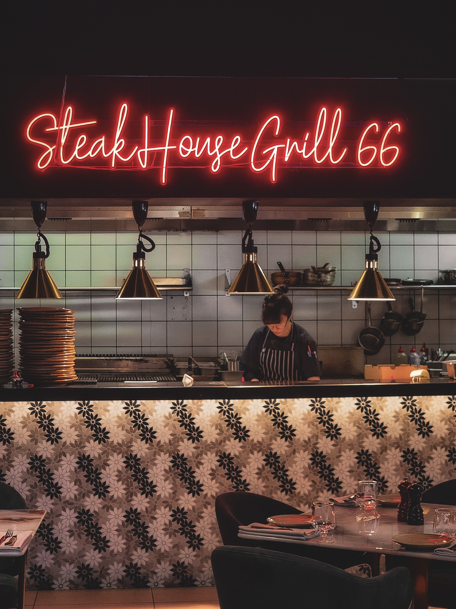 Steakhouse Grill 66 kitchen and sign